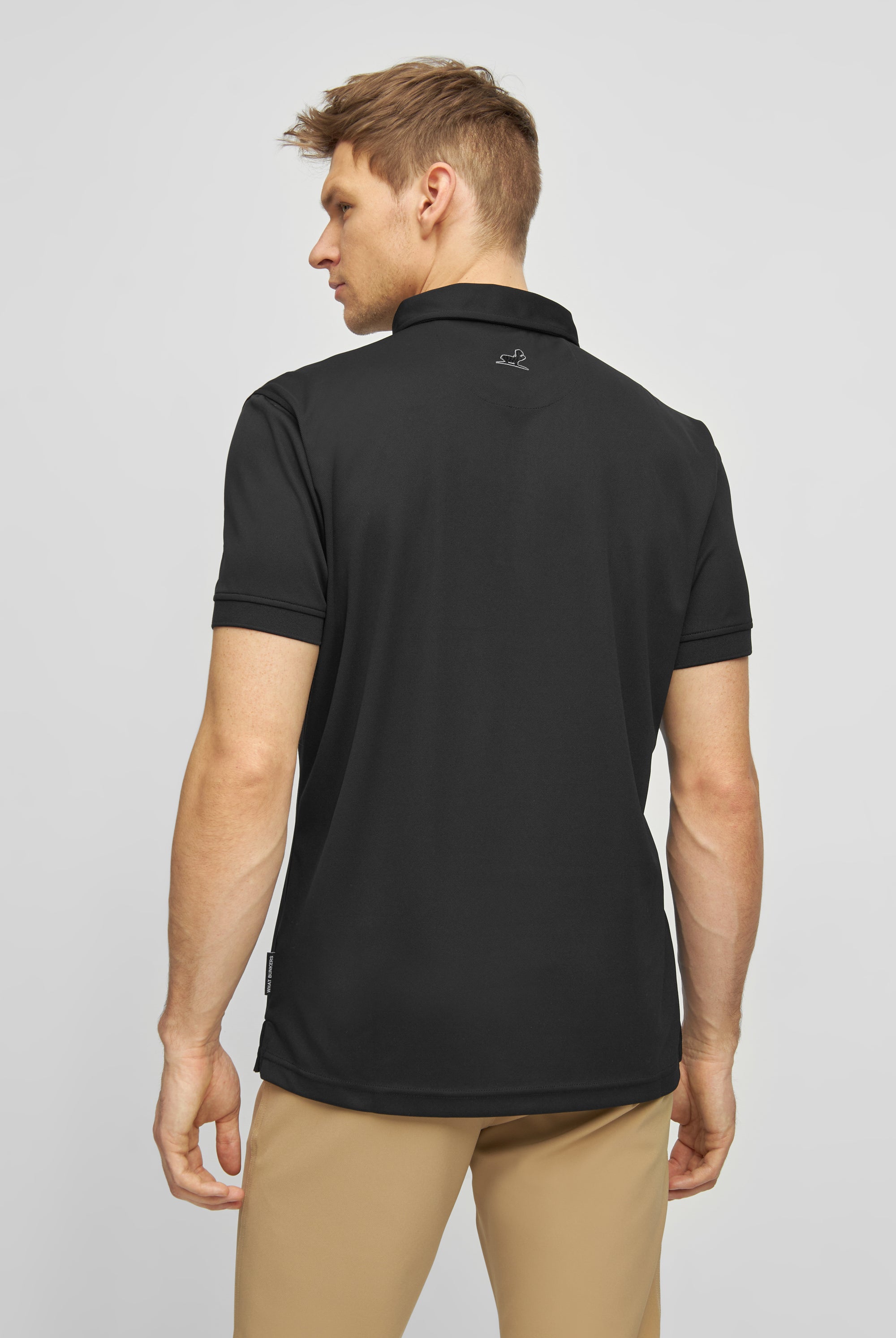 Black golf polo shirt with hippo WHAT BUNKERS logo